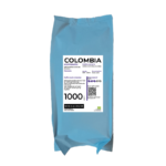 Blå kaffepose med etiketten 'Colombia Koffeinfri', som indeholder 1000 g økologiske koffeinfrie arabica-bønner med smagsnoter af mørk chokolade, stenfrugt og ingefær, fra Mokkahouse.