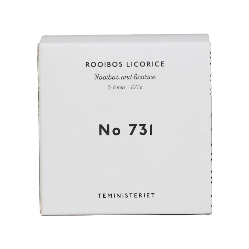 Teministeriet No. 731 Rooibos Licorice te i en stilren hvid æske. Æskens forside har sort skrift med produktnavnet "Rooibos Licorice" øverst, efterfulgt af en beskrivelse af ingredienserne: rooibos og lakrids. Under dette er bryggeanbefalingen angivet som 5-8 minutter ved 100°C. I midten står produktnummeret "No 731" i fed skrift, og nederst ses mærket "Teministeriet". Designet er minimalistisk og elegant med en neutral baggrund.