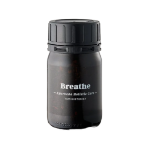 Ayurveda Breathe Te i sort beholder Sort, minimalistisk beholder med Ayurveda Breathe Te fra Teministeriet. En aromatisk urtete med pebermynte, ingefær og basilikum, skabt til at fremme afslapning og velvære.