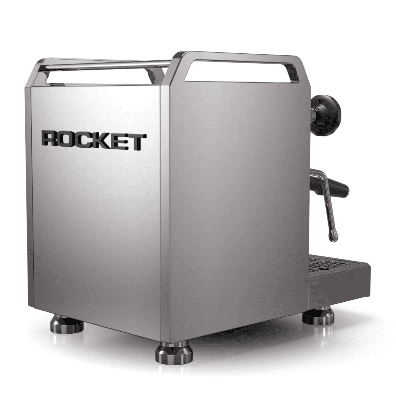 Rocket Mozzafiato V set bagfra/skråt med synligt ROCKET-logo på bagpanelet og bærehåndtag; refleksiv poleret stålfinish.